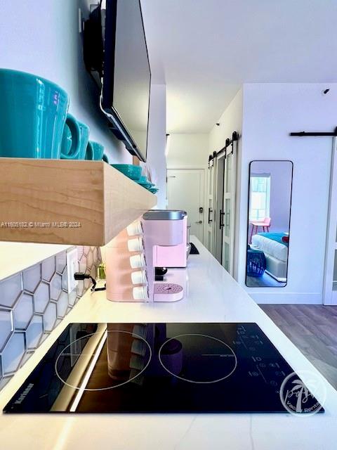 255 West 24th Street, Unit 308 Miami Beach, FL 33140 - Photo 2 of 31 a view of living room with furniture and a flat screen tv