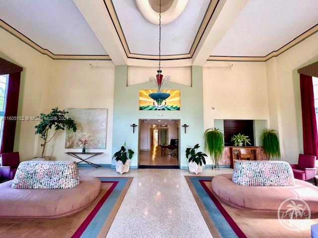 255 West 24th Street, Unit 308 Miami Beach, FL 33140 - Photo 28 of 31 a living room with furniture and a potted plant