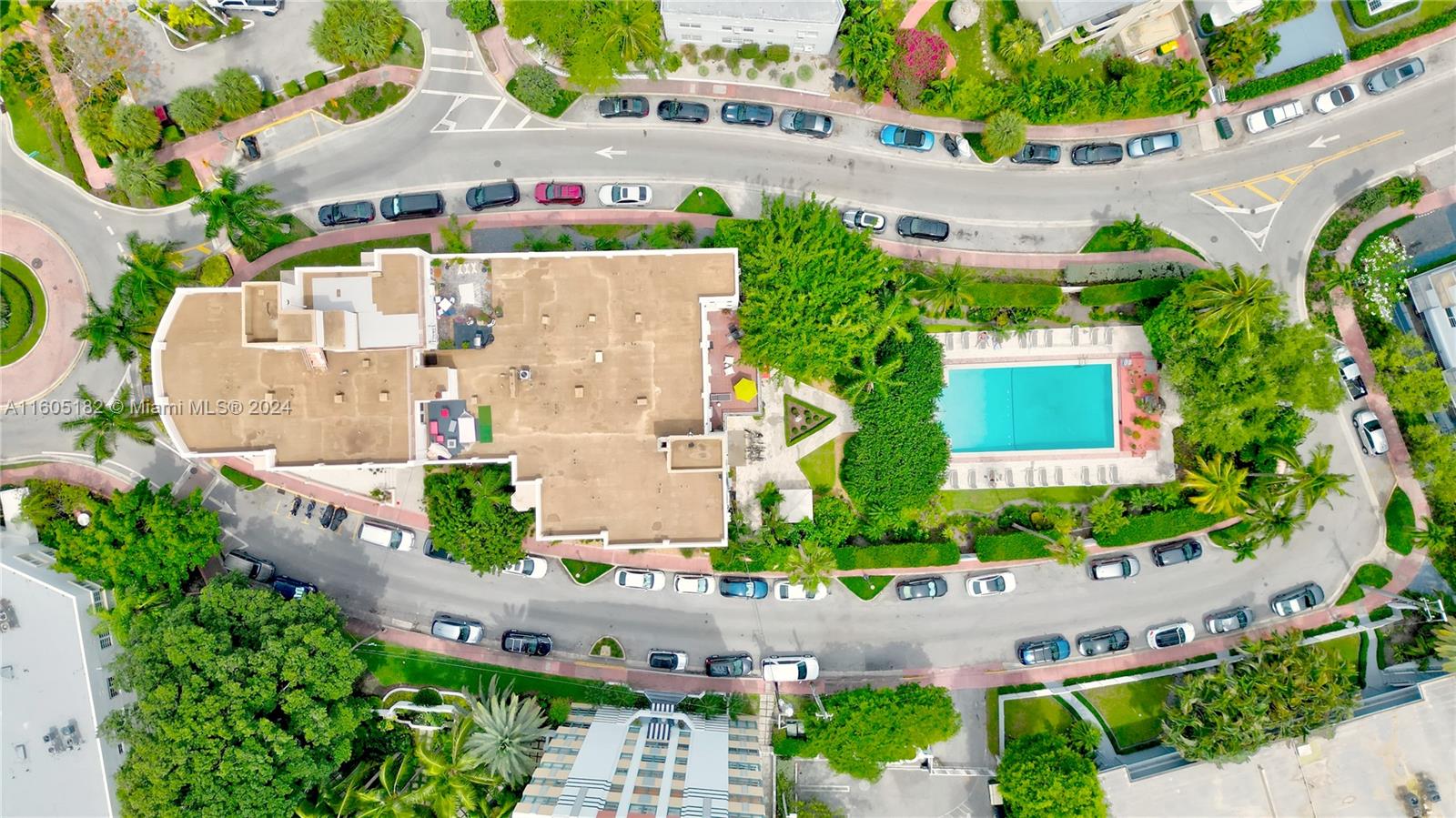 255 West 24th Street, Unit 308 Miami Beach, FL 33140 - Photo 7 of 31 an aerial view of house with yard and swimming pool