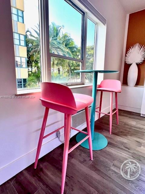 255 West 24th Street, Unit 308 Miami Beach, FL 33140 - Photo 10 of 31 a view of a room with furniture wooden floor and window