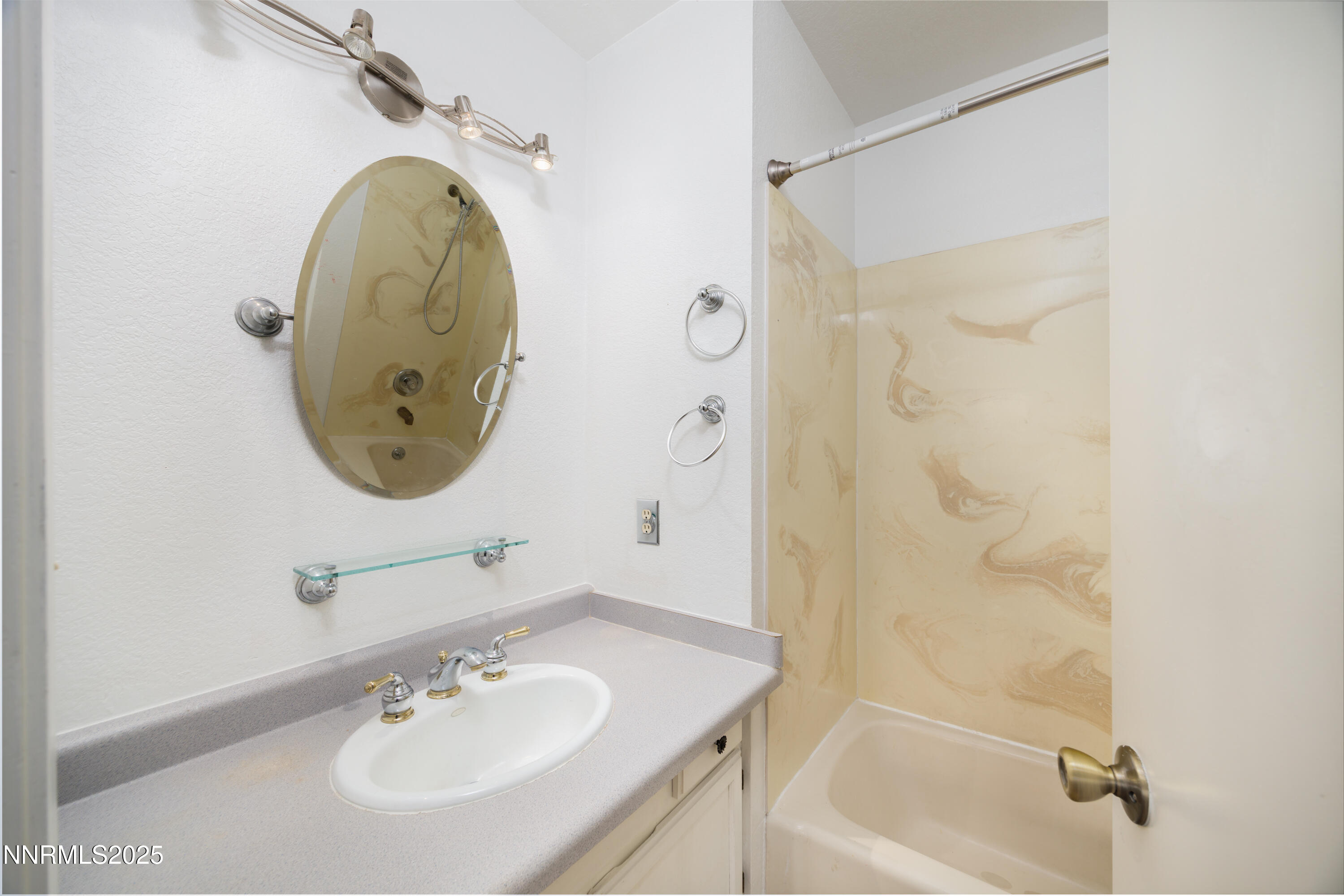 375 Hoge Road Reno, NV 89506 - Photo 12 of 36 a bathroom with a sink and a mirror