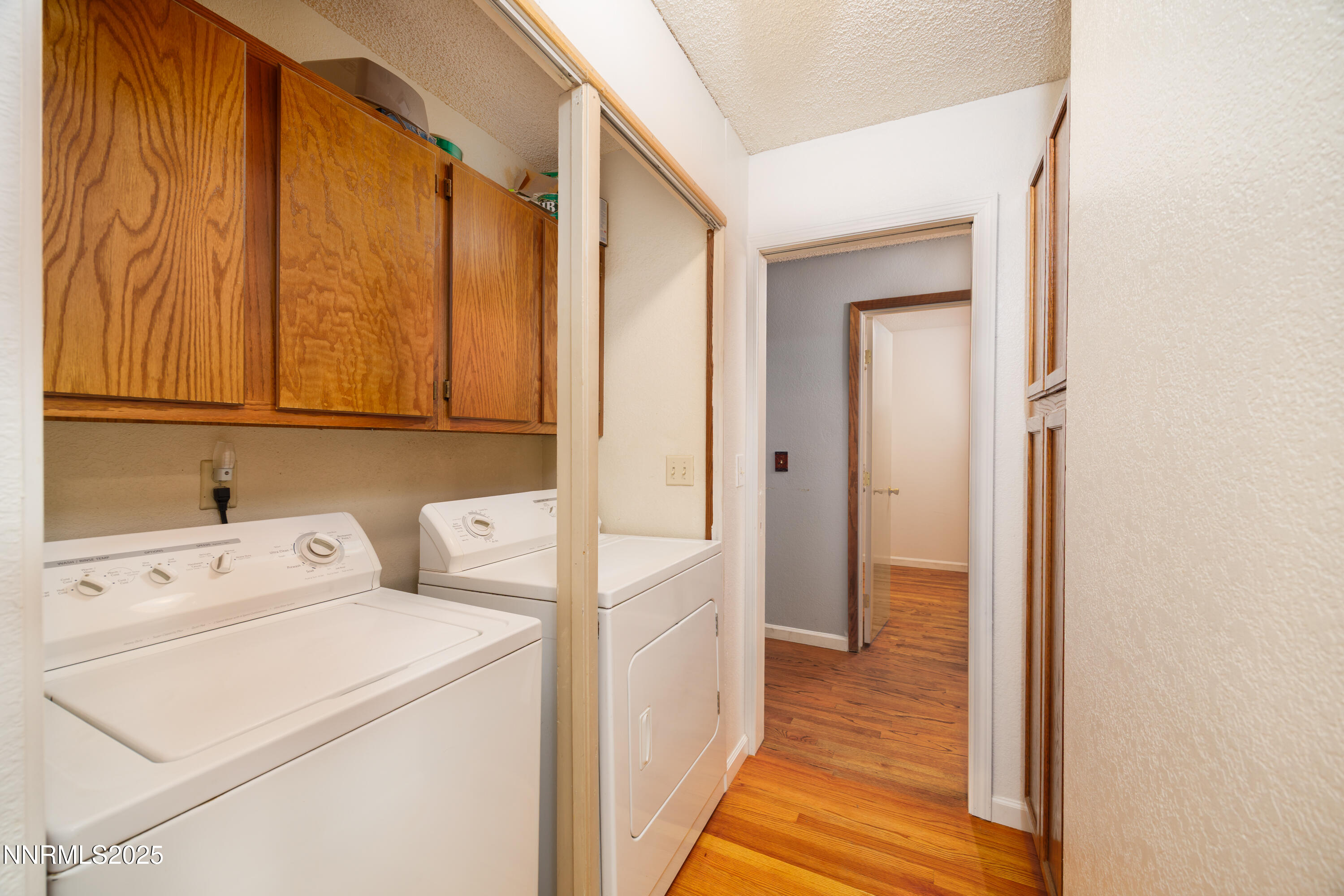 375 Hoge Road Reno, NV 89506 - Photo 15 of 36 a view of washer and dryer with kitchen view