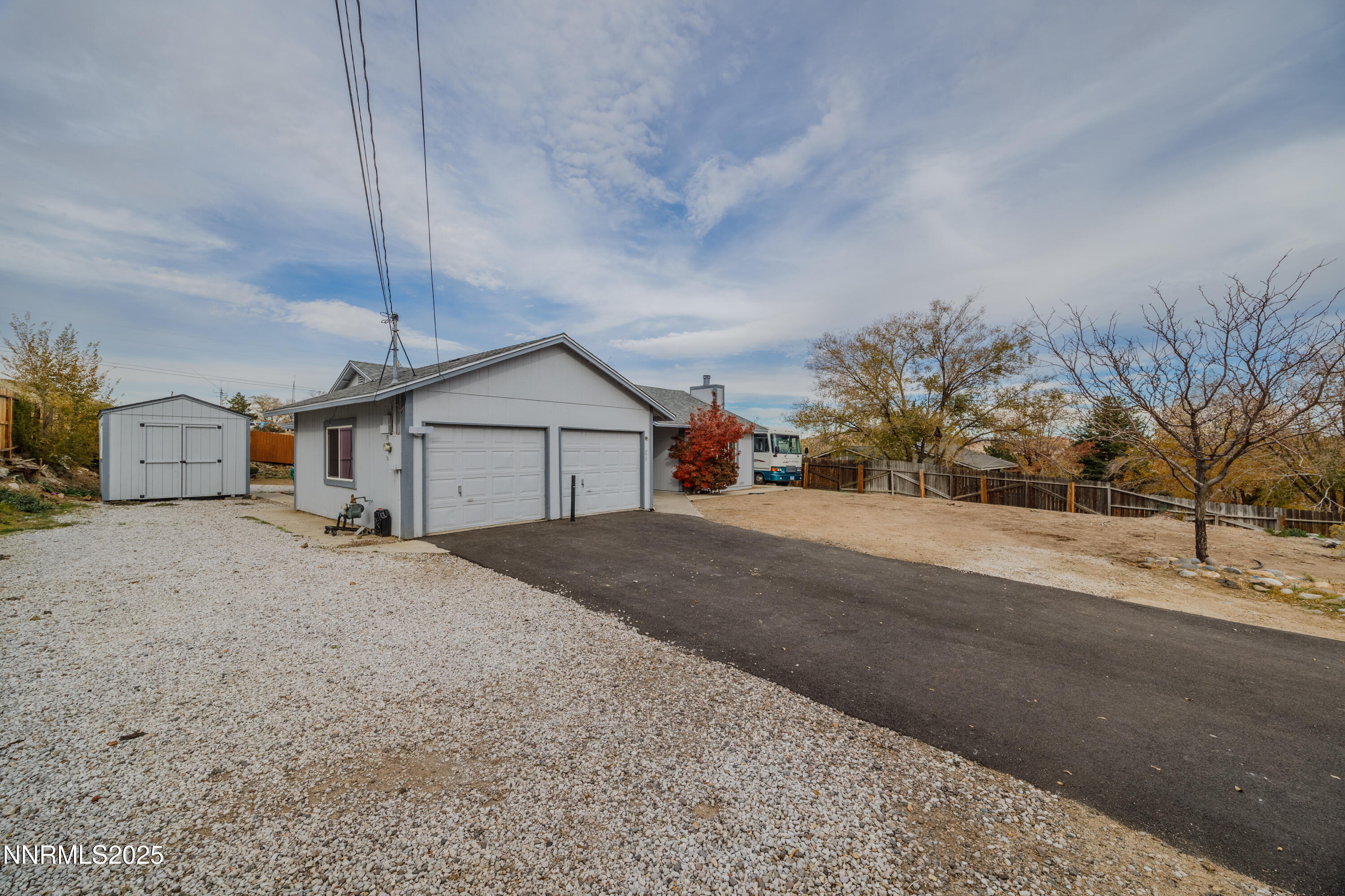 375 Hoge Road Reno, NV 89506 - Photo 19 of 36 a front view of house with a yard and garage