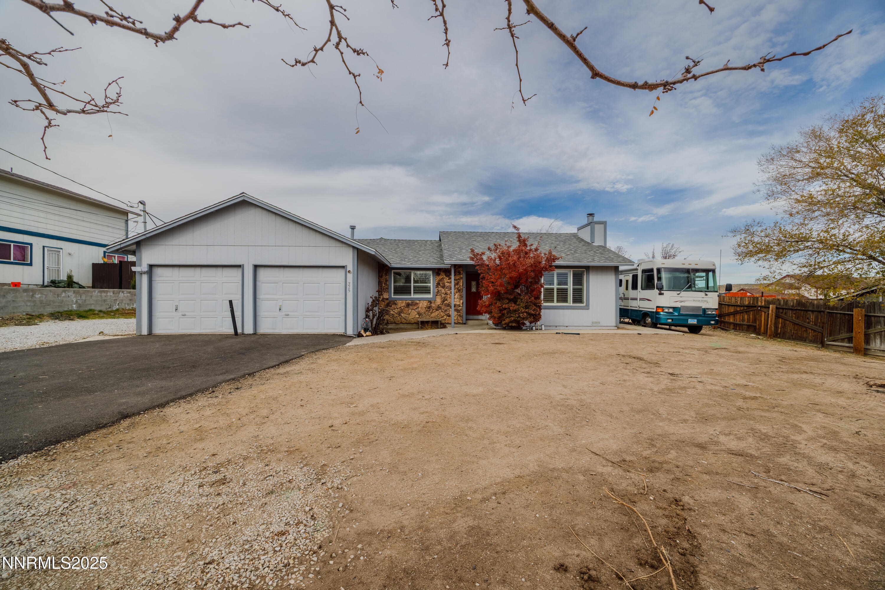 375 Hoge Road Reno, NV 89506 - Photo 20 of 36 a view of a house with a road