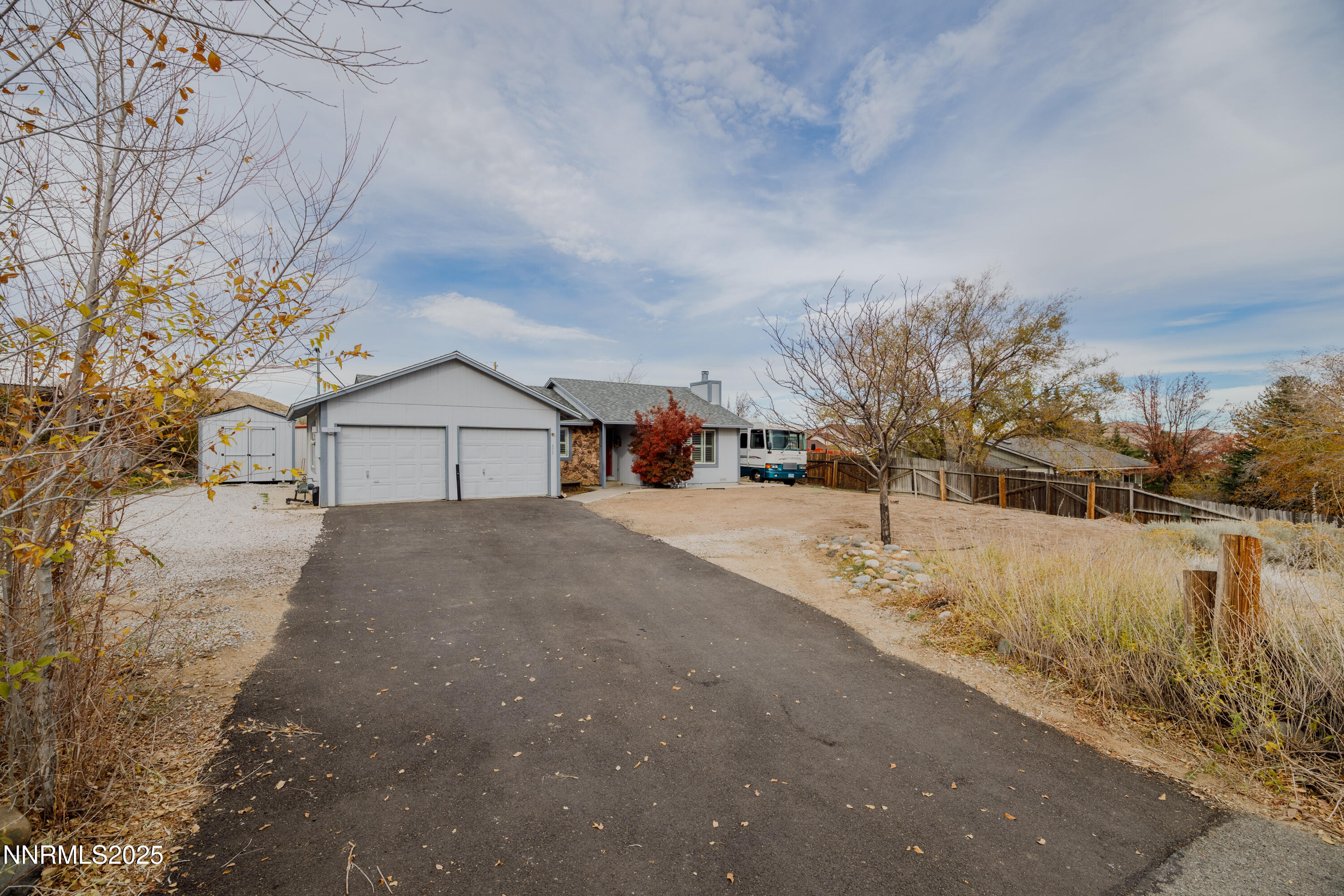 375 Hoge Road Reno, NV 89506 - Photo 22 of 36 a front view of a house with a yard