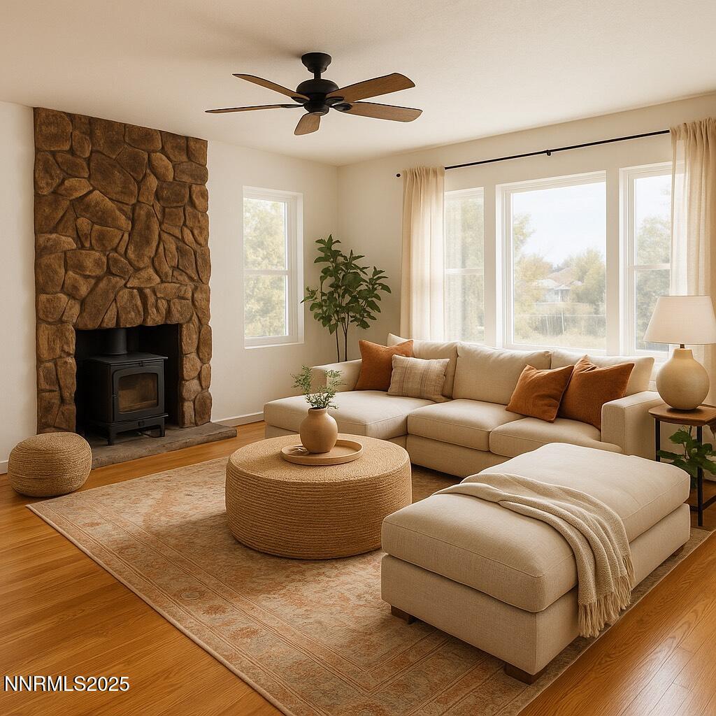375 Hoge Road Reno, NV 89506 - Photo 4 of 36 a living room with furniture and a fireplace