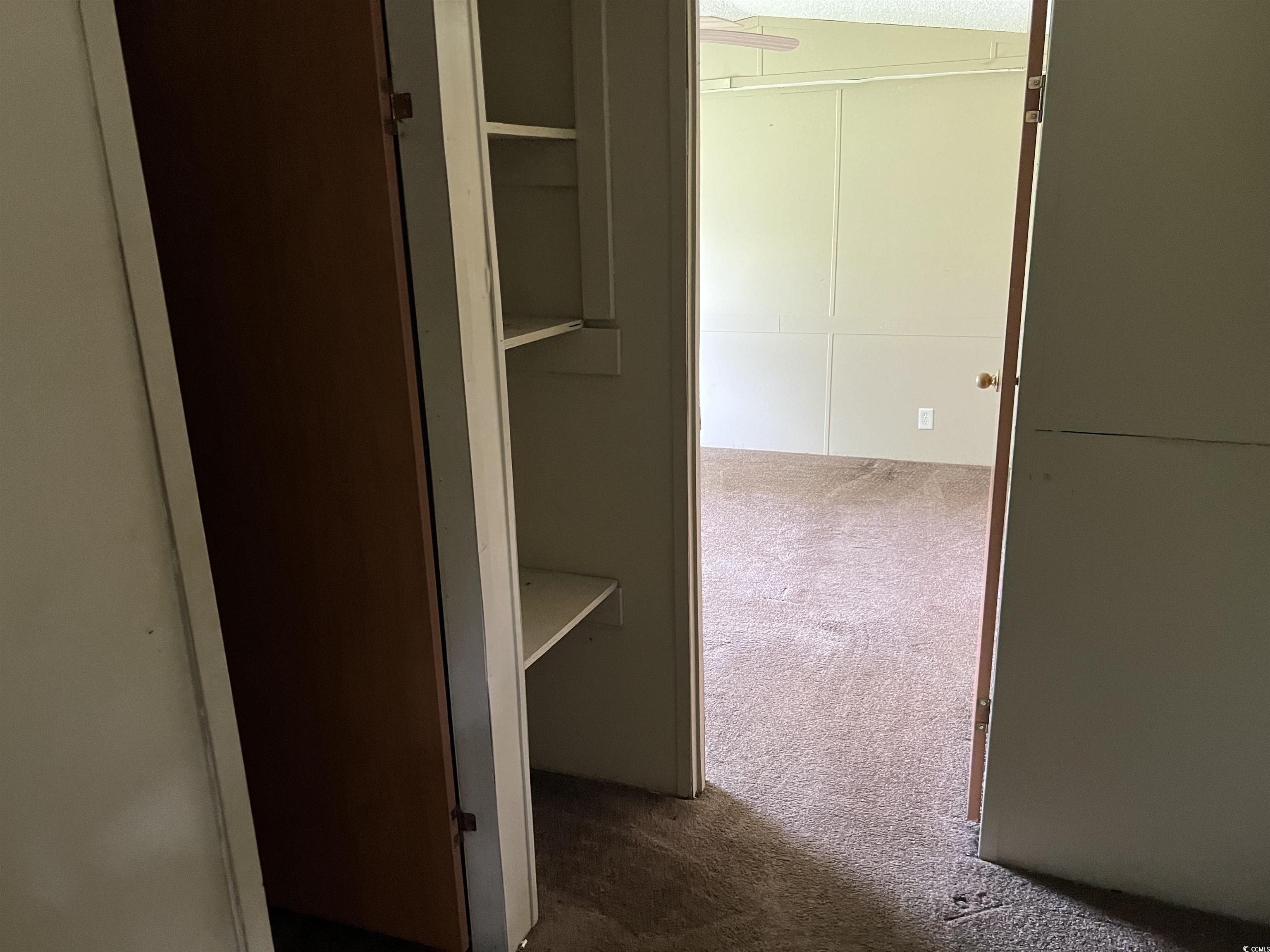 1118 Decatur Street Northeast Orangeburg, SC 29118 - Photo 5 of 14 Corridor with carpet