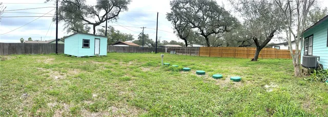 view of a city with an ocean