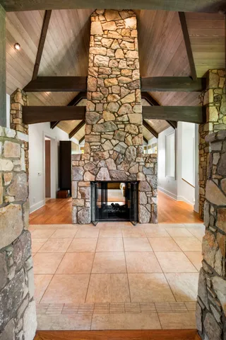 a view of an entryway with a fireplace