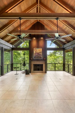 a spacious bathroom with a granite countertop sink mirror and shower