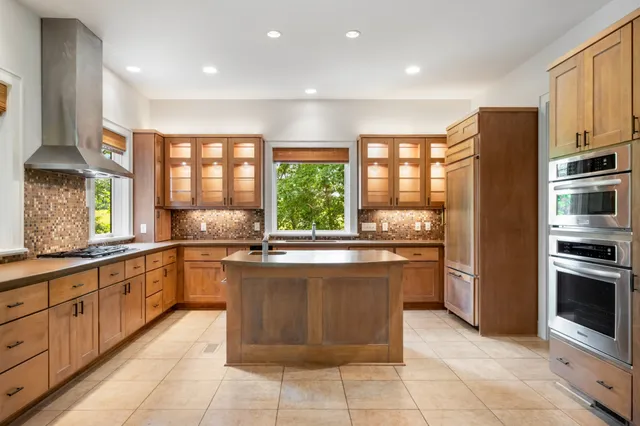 a view of a lake with a yard