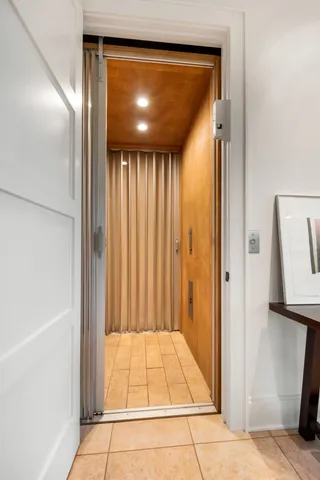 a kitchen with a stove a sink and a refrigerator