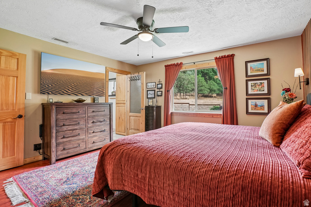 400 High Bench Road Alpine, UT 84004 - Photo 23 of 34 Wood-finish flooring with a ceiling fan