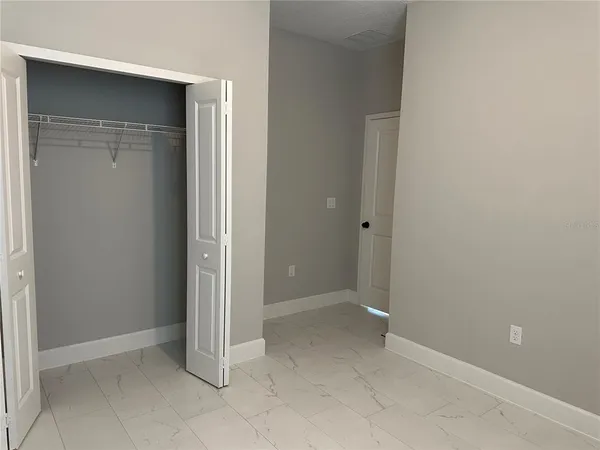 an empty room with closet