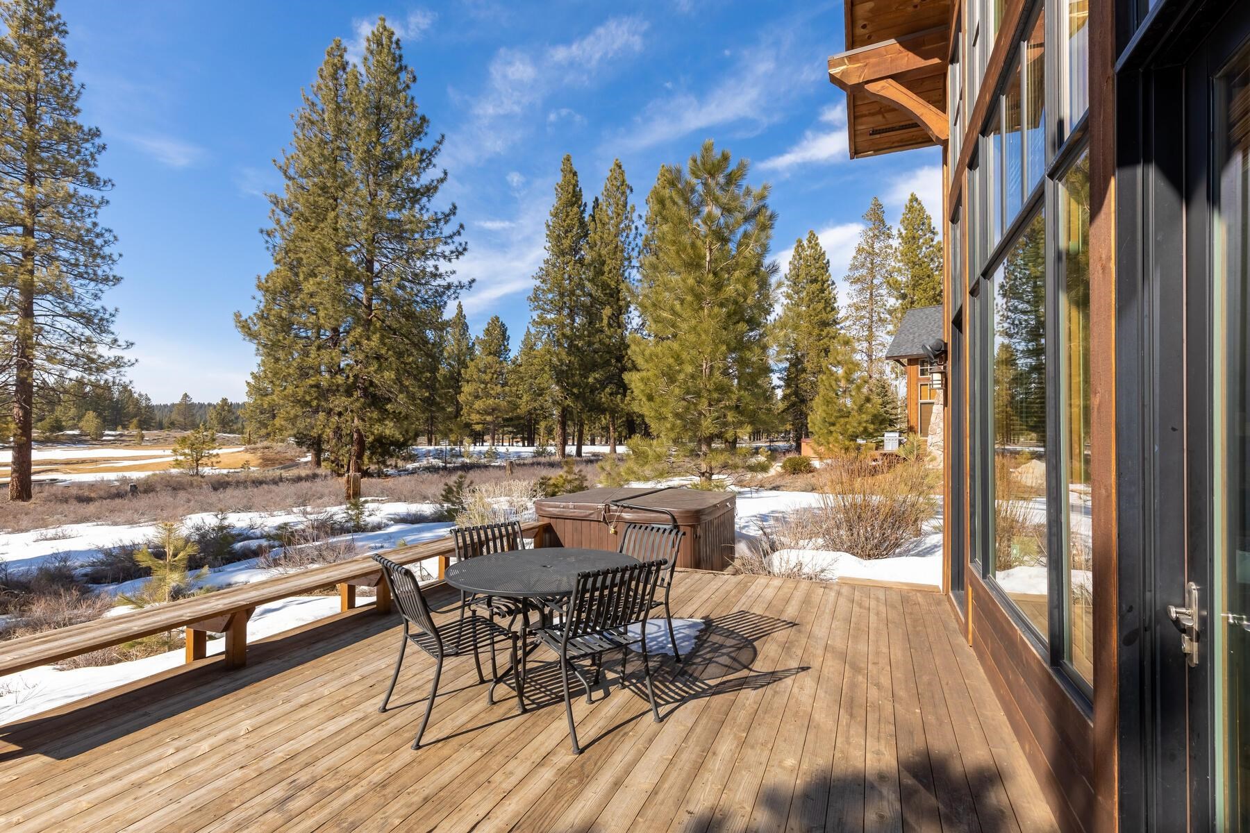 12308 Frontier Trail, Unit F2652 Truckee, CA 96161 - Photo 21 of 21 a view of a patio with dining table and chairs with wooden floor