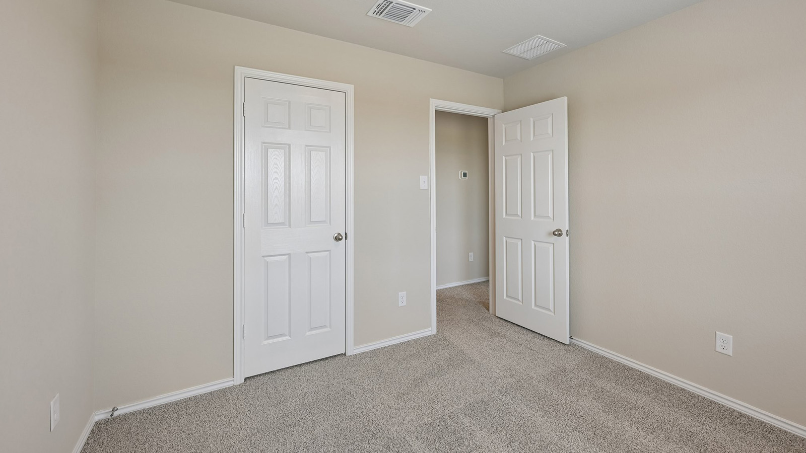 372 Old Stage Coach Road Jarrell, TX 76537 - Photo 18 of 25 Soft carpeting underfoot and clean lines define this versatile secondary bedroom space.