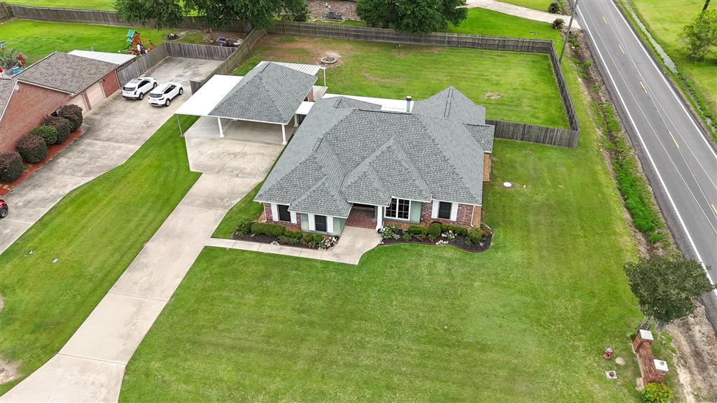 4510 Oak Ridge Drive Sulphur, LA 70665 - Photo 4 of 25 Beautiful landscaped yard and fenced backyard