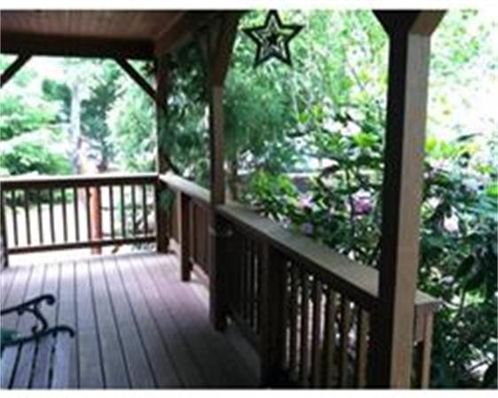 51 Bluff Road Bourne, MA 02561 - Photo 6 of 30 a view of balcony with wooden floor