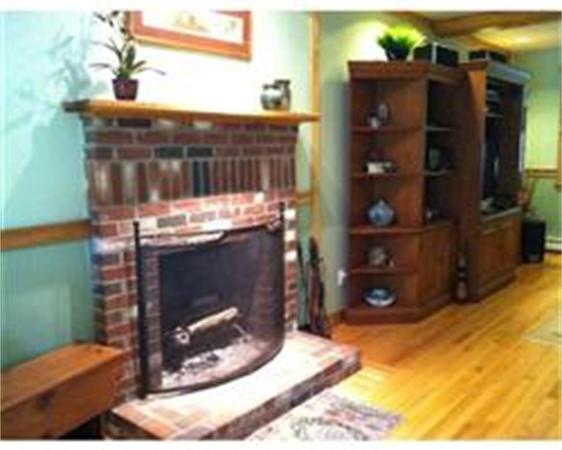 51 Bluff Road Bourne, MA 02561 - Photo 9 of 30 a room with fireplace and furniture
