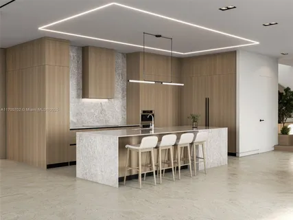 a kitchen with a table and chairs