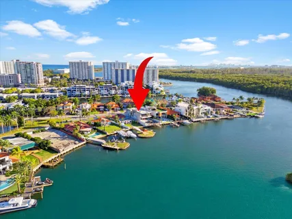 a room with lots of residential buildings and ocean view