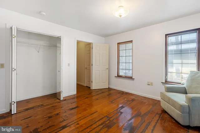 a room with a walk in closet and a window