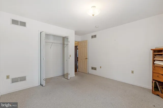 a view of small space with racks on the wall