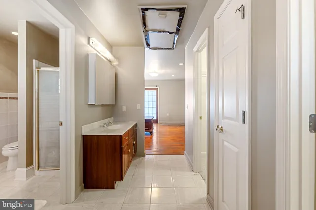 a view of swimming pool with a backyard and deck