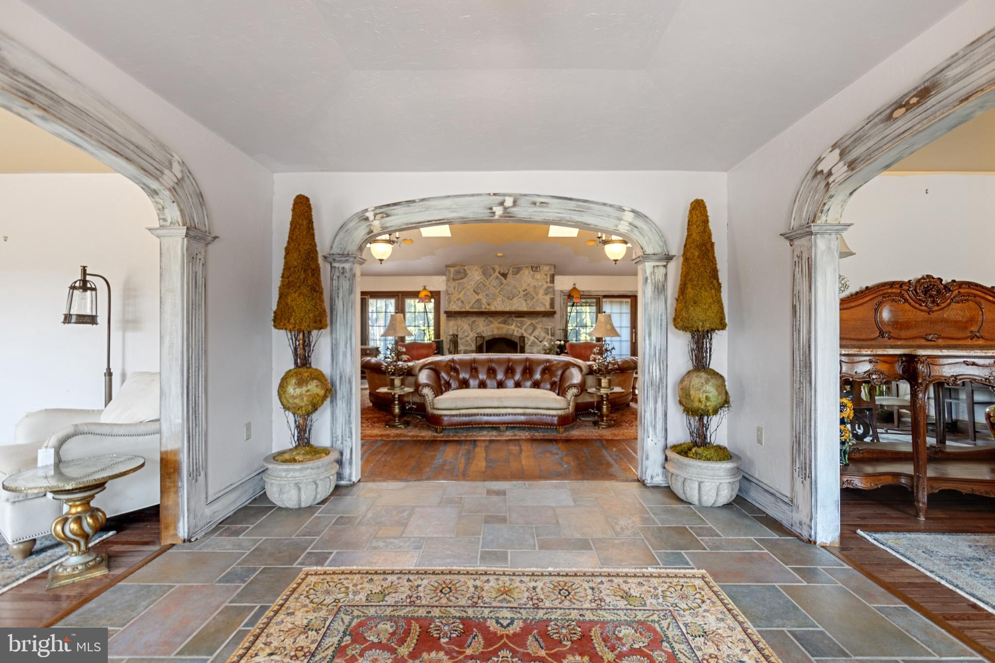 15 Baltray Road Dover, DE 19904 - Photo 5 of 59 a living room with furniture and a chandelier