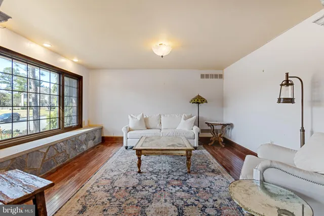 a living room with a rug
