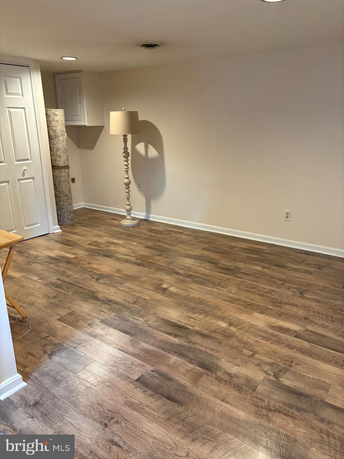 1809 Merritt Boulevard Baltimore, MD 21222 - Photo 14 of 33 a view of empty room with wooden floor