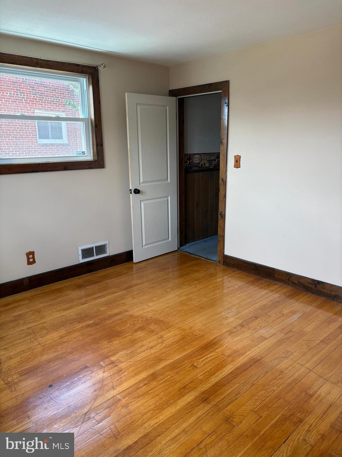 1809 Merritt Boulevard Baltimore, MD 21222 - Photo 22 of 33 a view of an empty room with closet and mirror
