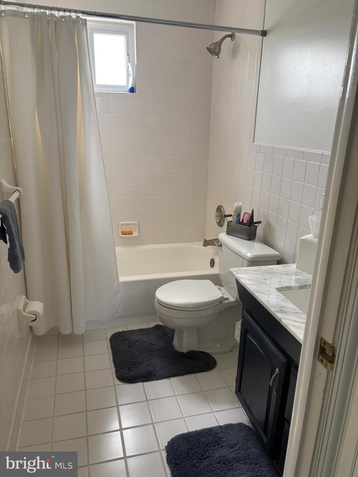 1809 Merritt Boulevard Baltimore, MD 21222 - Photo 23 of 33 a bathroom with a sink a toilet and shower