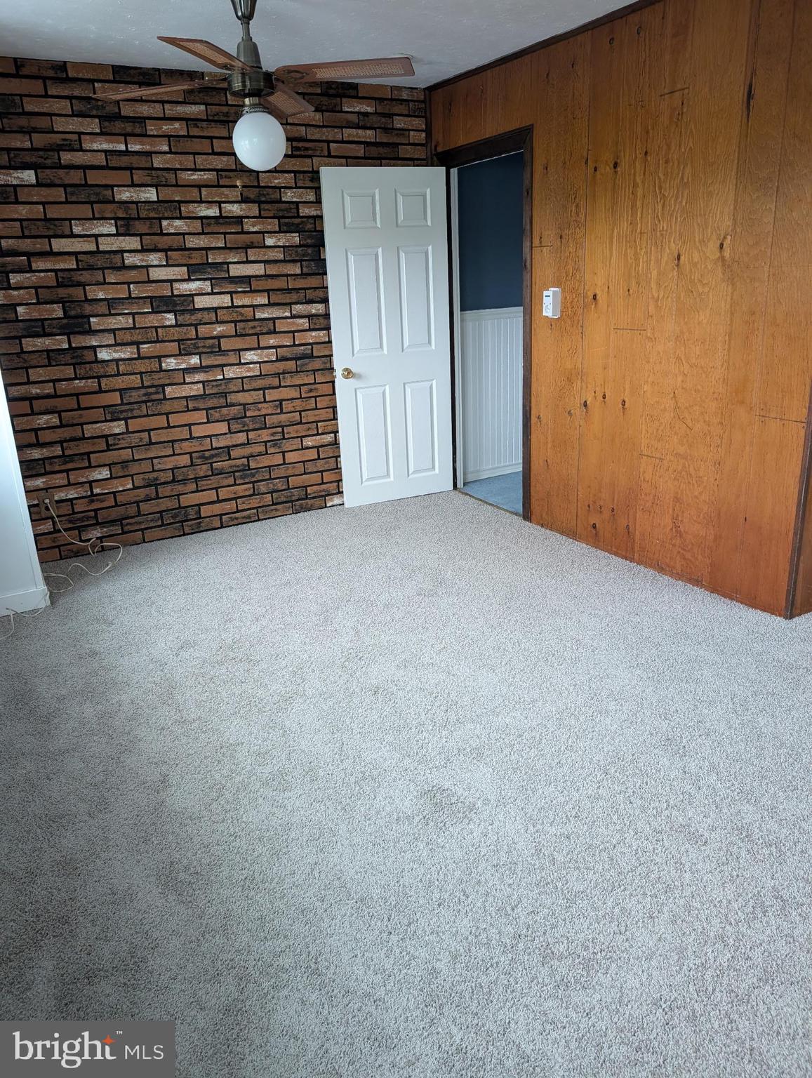 1809 Merritt Boulevard Baltimore, MD 21222 - Photo 25 of 33 a view of an empty room with a fireplace