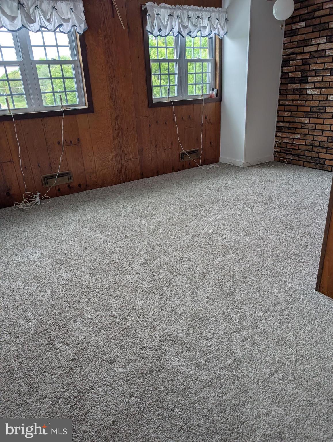 1809 Merritt Boulevard Baltimore, MD 21222 - Photo 26 of 33 an empty room with windows
