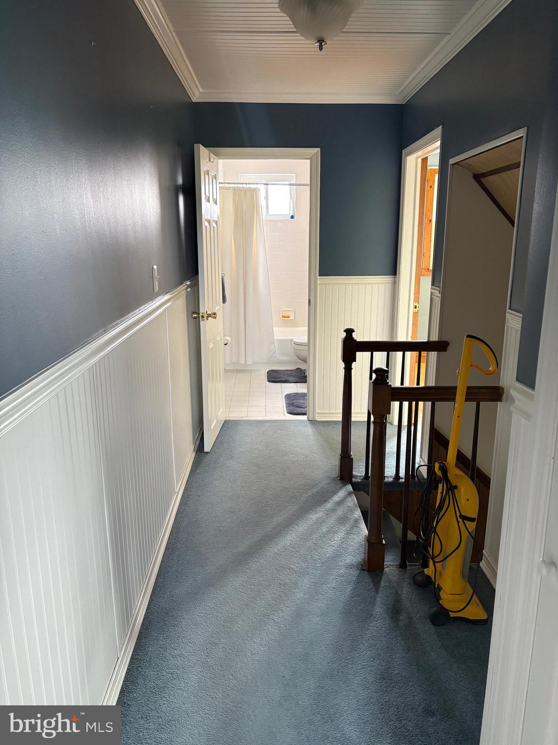 1809 Merritt Boulevard Baltimore, MD 21222 - Photo 29 of 33 a view of a hallway with couches and mirrors