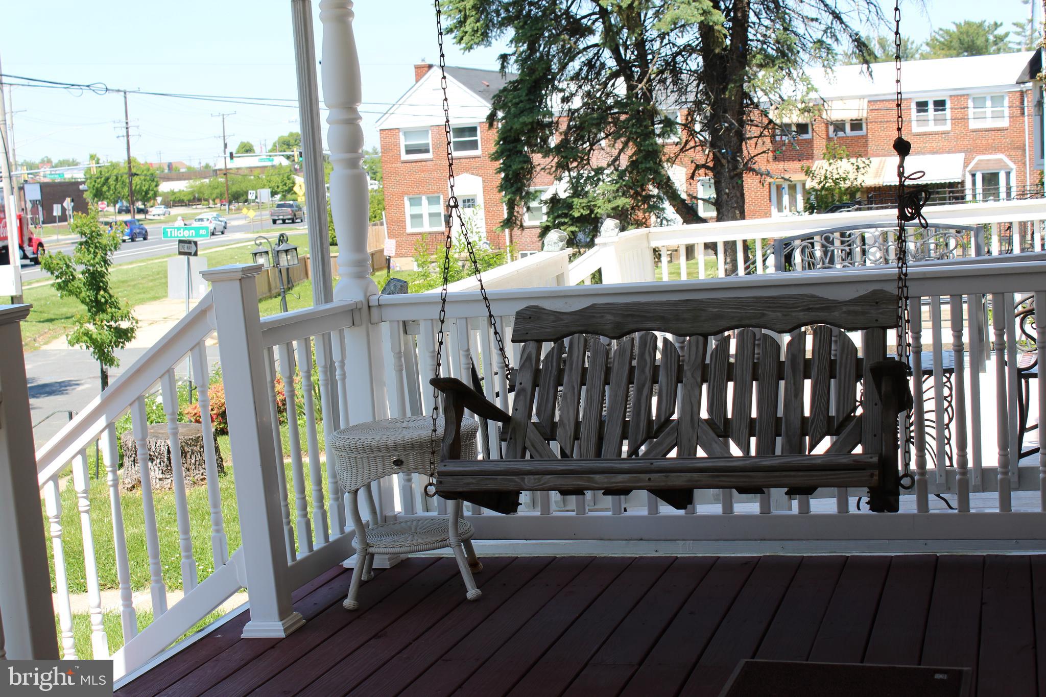 1809 Merritt Boulevard Baltimore, MD 21222 - Photo 3 of 33 a view of a wooden chairs on the deck