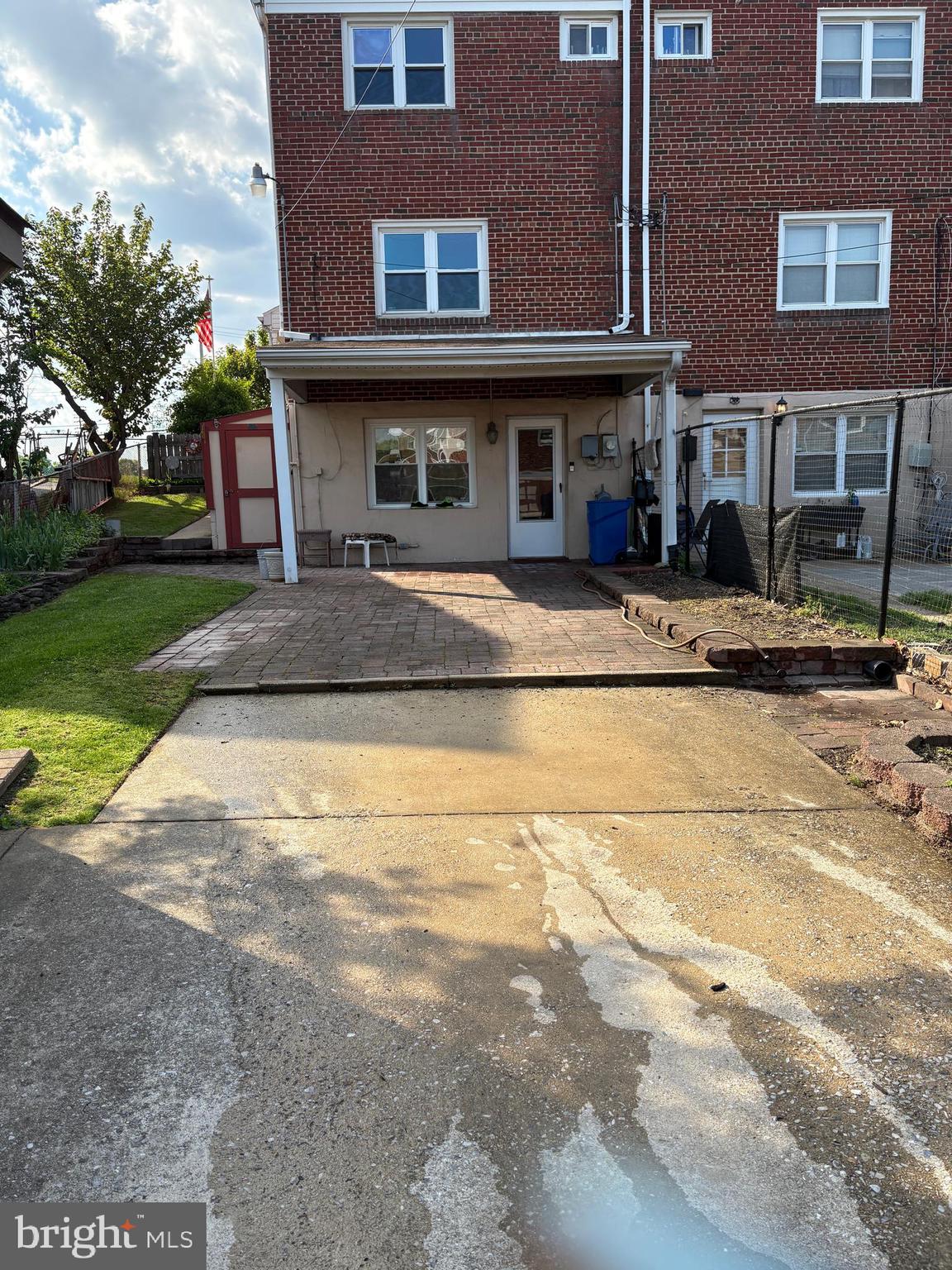 1809 Merritt Boulevard Baltimore, MD 21222 - Photo 32 of 33 a view of a building with a yard and plants