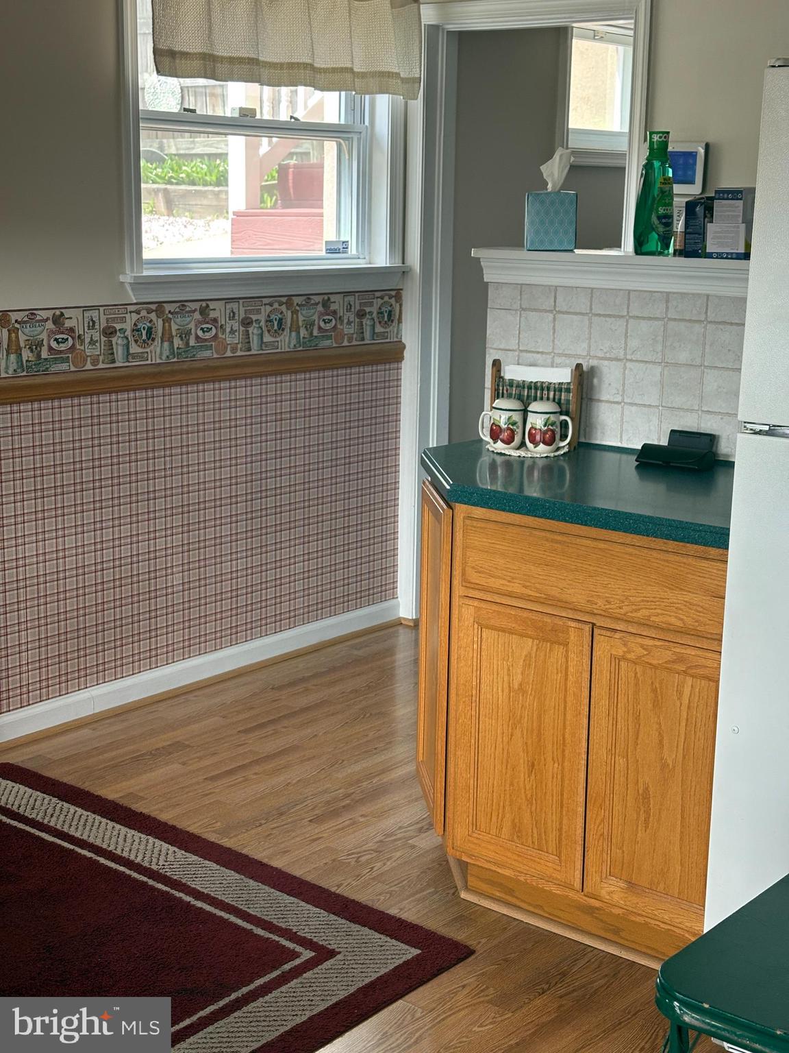 1809 Merritt Boulevard Baltimore, MD 21222 - Photo 10 of 33 a view of wooden floor and a window