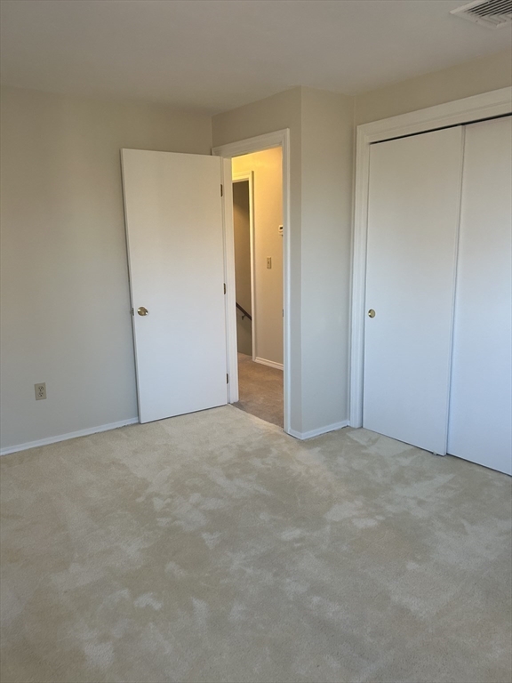 34 Uxbridge Road Sutton, MA 01590 - Photo 20 of 37 a view of an empty room with closet and a window