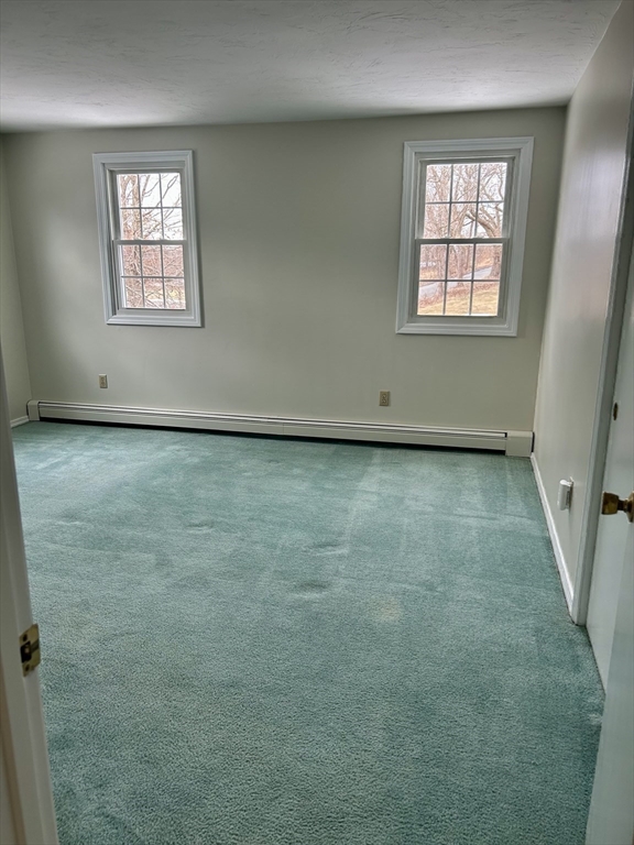34 Uxbridge Road Sutton, MA 01590 - Photo 23 of 37 an empty room with windows