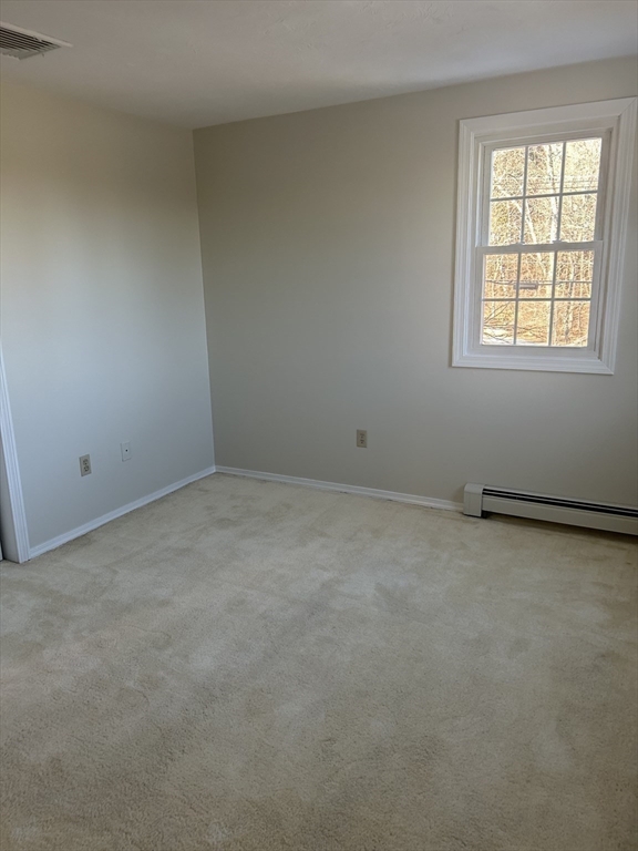 34 Uxbridge Road Sutton, MA 01590 - Photo 25 of 37 an empty room with a window