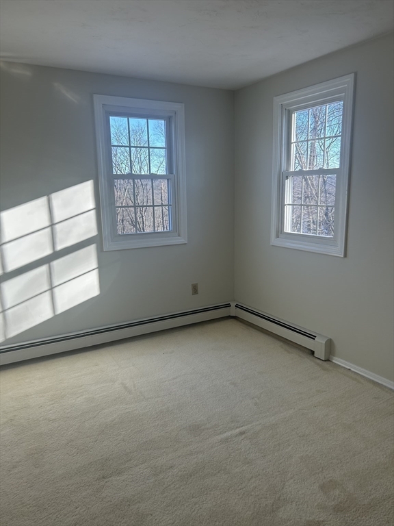 34 Uxbridge Road Sutton, MA 01590 - Photo 29 of 37 an empty room with a window