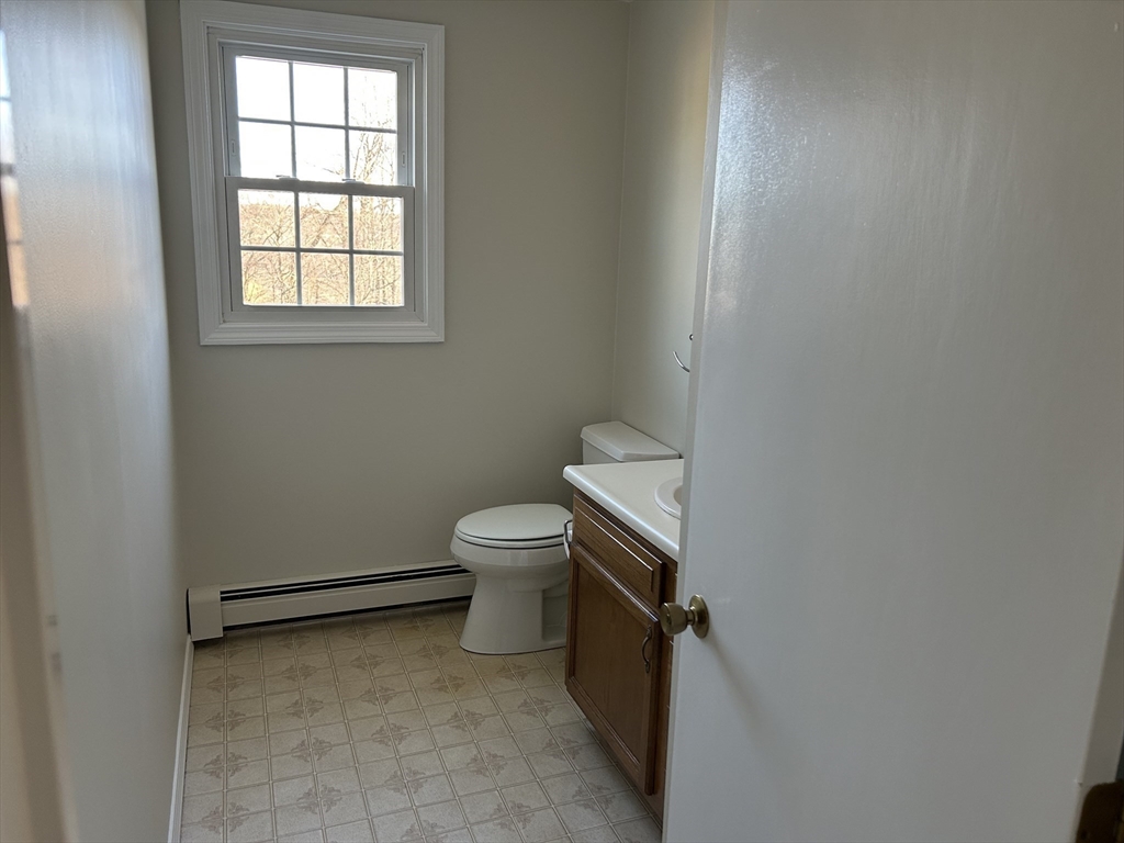 34 Uxbridge Road Sutton, MA 01590 - Photo 34 of 37 a bathroom with a toilet