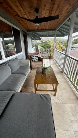 a view of porch with a seating space