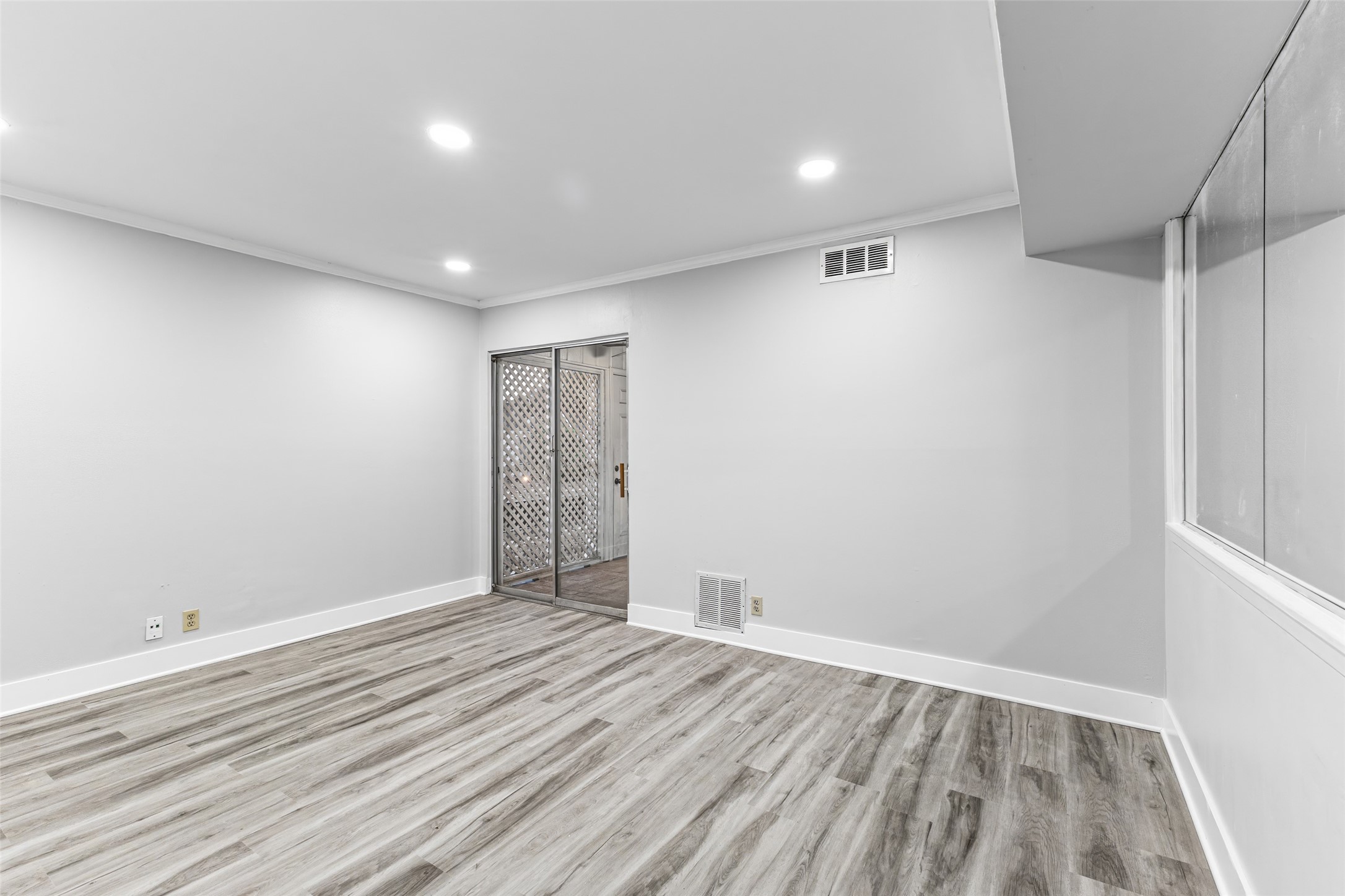 2501 Marilee Lane, Unit 4 Houston, TX 77057 - Photo 13 of 21 bedroom with access to enclosed balcony