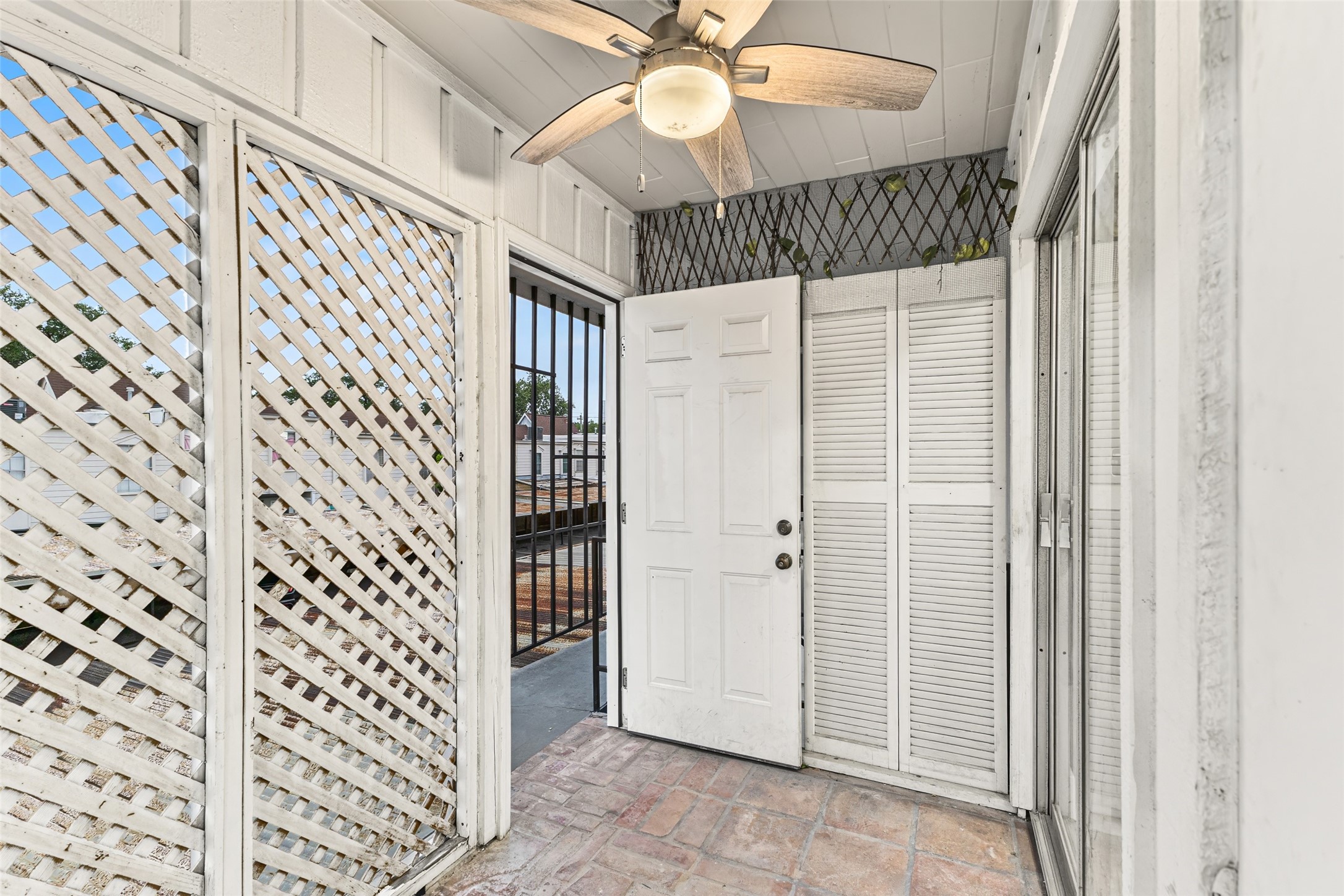2501 Marilee Lane, Unit 4 Houston, TX 77057 - Photo 17 of 21 enclosed balcony at rear of condo