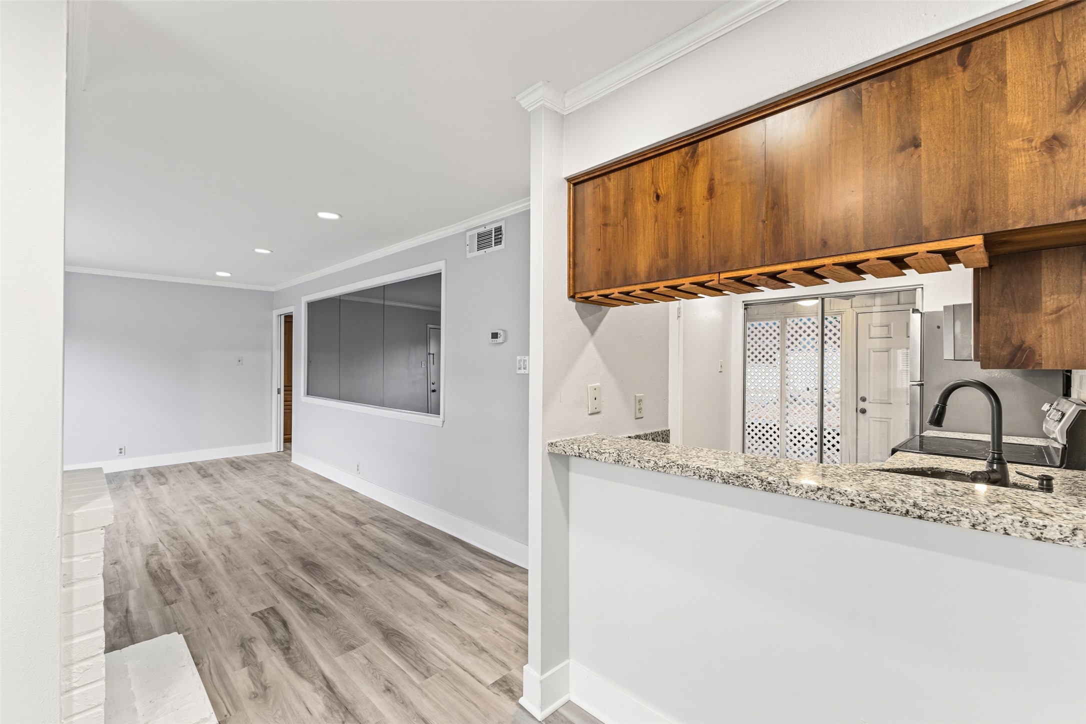 2501 Marilee Lane, Unit 4 Houston, TX 77057 - Photo 8 of 21 view of the kitchen and living from the dining area