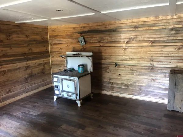a view of livingroom with wooden floor