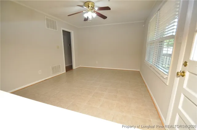 an empty room with windows